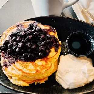 Lemon ricotta pancakes smothered in blueberries