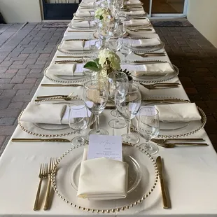 a table set for a formal dinner