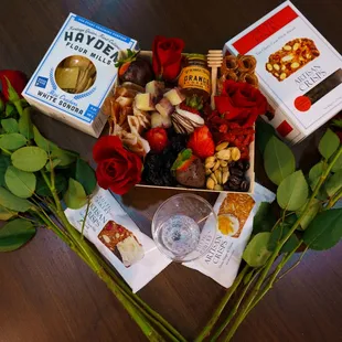 a box of nuts and roses