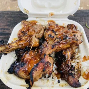 chicken and rice in a styrofoam container