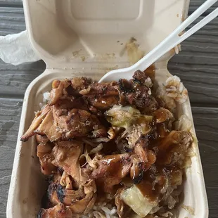 chicken and rice in a styrofoam container