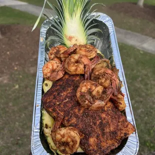 Salmon and shrimp pineapple bowl