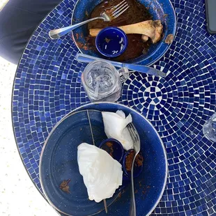 The aftermath of a delicious meal. The Lamb Salad with Lamb (6oz) and the Lamb Shank ( the current special).