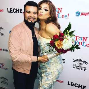 a man and a woman posing for a picture