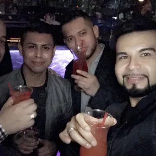 a group of men at a bar