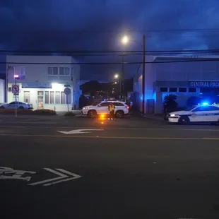 Police blocking the road in prepare for the KALIHI Christmas parade *11/29/24