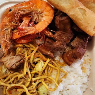 Plate Lunch with rice, pancit, adobo, fried garlic shrimp, and banana lumpia