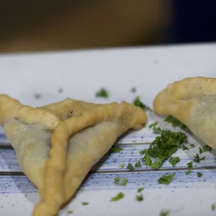 two empanadas on a plate