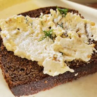 Amazing dark bread with a spread that was also amazing. Not sure what it was...but we used it all.