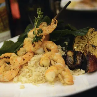 Paleo!!  Lime and ginger Shrimp, Grilled Vegetables and Cauliflower rice.