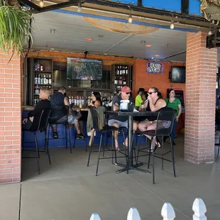 people sitting at the bar