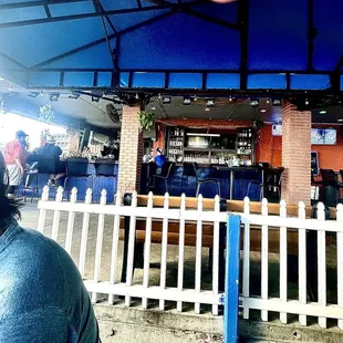 The bar with plenty of seats you can sit at &amp; more tables by it.