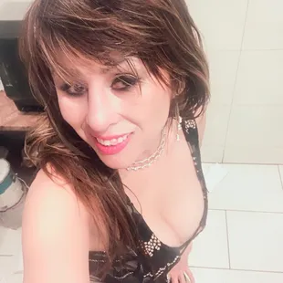 a woman sitting on a toilet