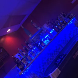 a bar with blue lights