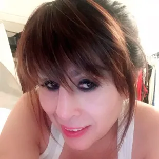 a woman laying on a bed