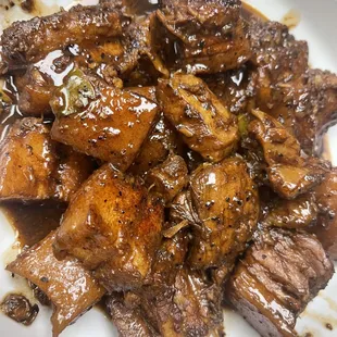 PORK ADOBO Service Rice and Macaroni salad MIN: $10.25 REG: $14.99