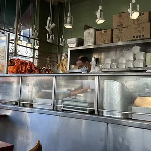 The same angry owner chopping away without cleaning his hands after handling the money (2022) LOL