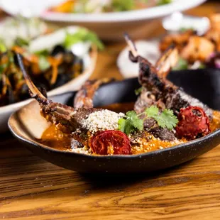 a plate of food on a wooden table