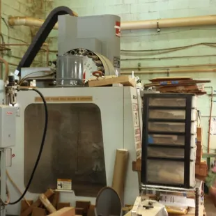 Back in the day,  four ukulele necks would be produced in an 8 hour shift...This machine speeds up the process about 10 X now