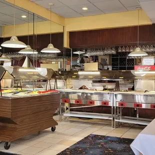 a view of the kitchen and dining area
