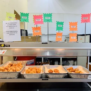 trays of doughnuts on display