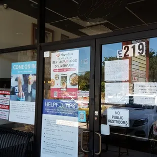 Kamalan Bakery was operating during CoVid19 lockdown back in June 2020. So many signs posted on the windows.