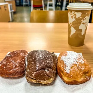 Classic Malasada, Poi Glazed, Haupia Malasada (R-L)