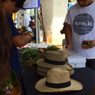There's a haku lei-making booth