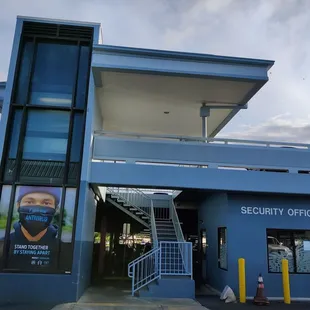 The Security Office is located next to the stairs (and elevator) to the upper parking level
