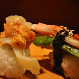 Mirugai (left) and crab + avocado (right) sushi