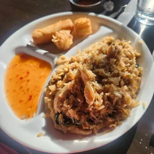 Lunch special chicken basil rice with a spring roll and shumai