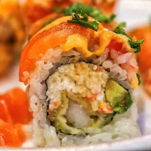 a plate of sushi rolls