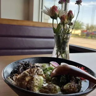 a bowl of food on a table