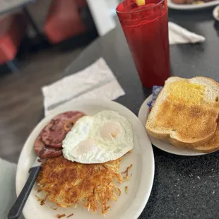 Bone in ham so savory with hash browns, sour dough toast , and eggs