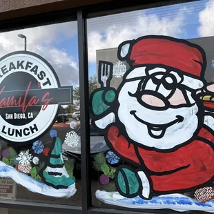 santa holding a plate of food