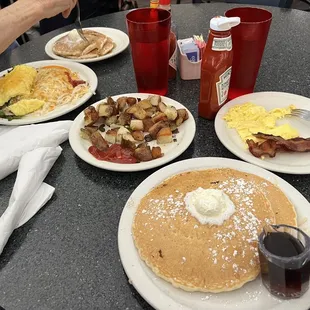 Veggie omelet hashbrowns country potatoes pancakes bacon scrambled eggs