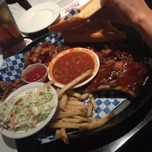 My wife&apos;s bling bling and rib dinner! Too much for one person and just about enough for two... We did have to take a to go box!