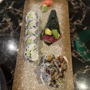 a plate of sushi on a table