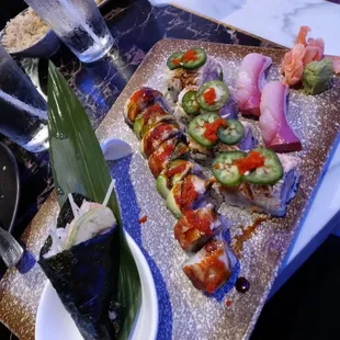 California hand roll, yellowtail nigiri, black dragon roll,  Snow Mountain Roll