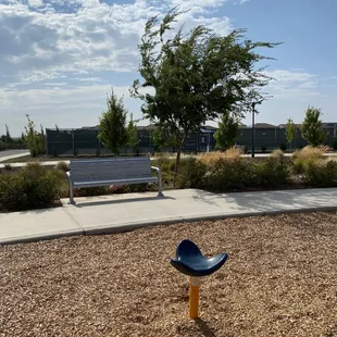 Tennis courts in the background.
