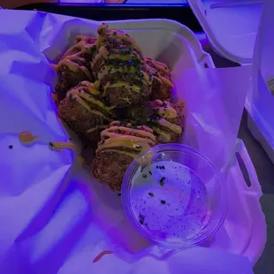 a plate of food and a drink on a table