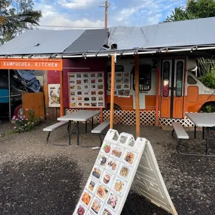 a sign in front of a restaurant
