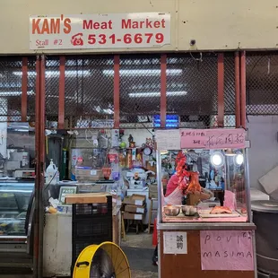 a woman selling meat