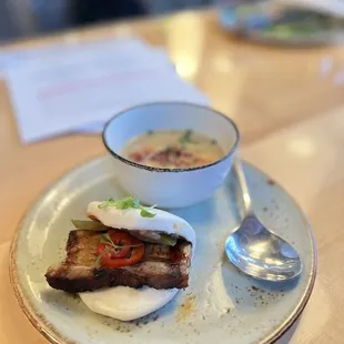 a bowl of soup and a sandwich