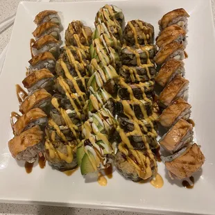 a large plate of sushi