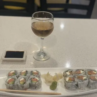 Philadelphia roll and one of my favs spicy yellowtail with cream cheese. Plum wine