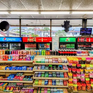 Snacks, snacks and more snacks! Get it here, shelves are stocked well. So is the cooler with beverages.