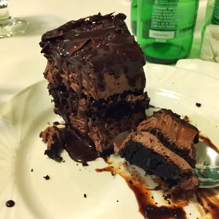 Possibly the best chocolate cake I've ever had! Rich, but not overly sweet mousse cake w/delicious chocolate dropped down the sides