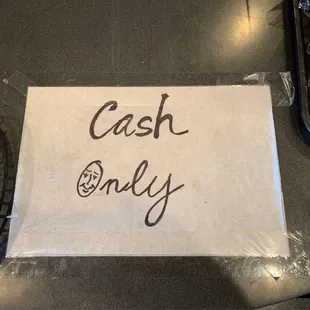 Cash only even though major credit cards stickers are on the front door