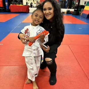 First belt grad from white belt to orange! My girl did so well and fell in love with the tiger program so fast! :)